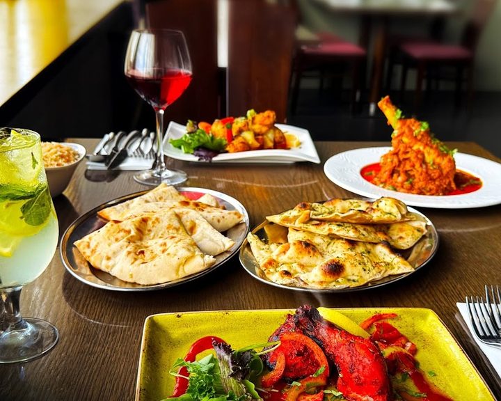 A generous spread of curries, rice and breads at Bengal Brasserie on Lisburn Road
