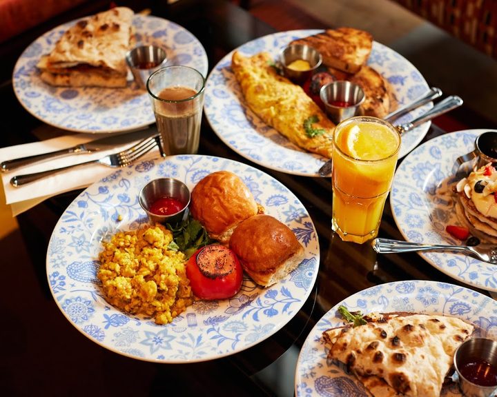 Indian sharing dishes at Dishoom Canary Wharf