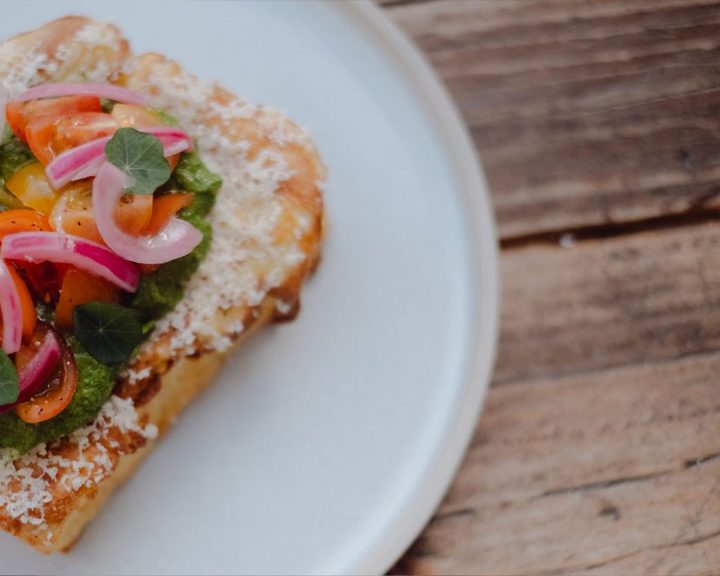 An open sandwich with smoked fish, pickles and salad at Edinburgh Larder Cafe