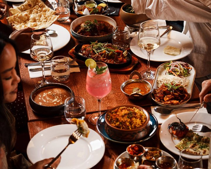 Table of Nepalese and Indian dishes at Gautam’s in Abbeyhill