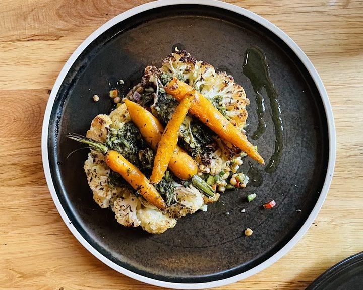 Seasonal plant-based dish with roasted carrots at Hendersons in Edinburgh