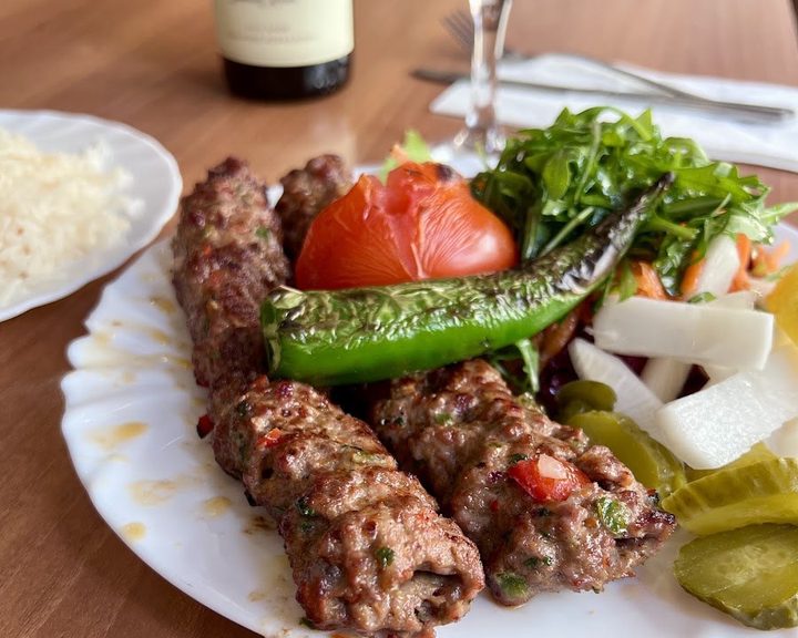Charcoal-grilled kebabs, rice and salad at Mangal 1 in Dalston