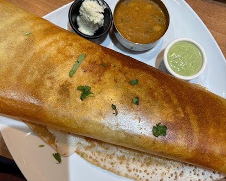 A crisp masala dosa with sambar and chutneys at Mums Daily Indian Restaurant in Cardiff
