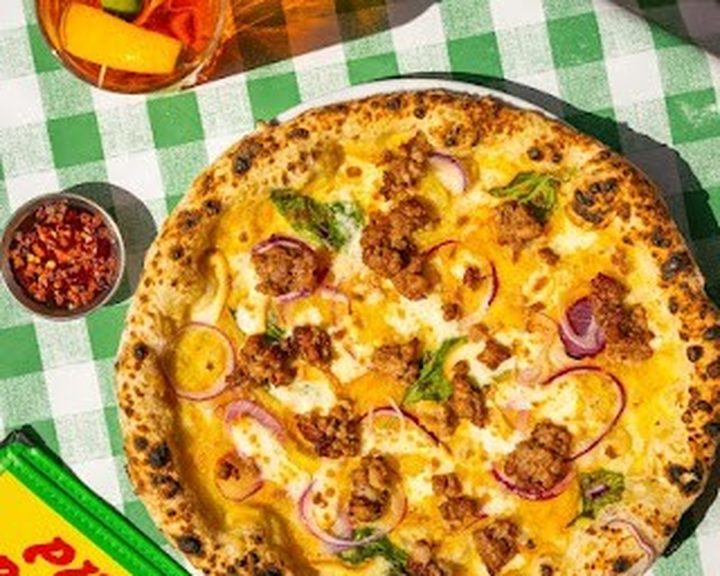 Neapolitan pizzas with fresh toppings at Pizza Pilgrims Cardiff