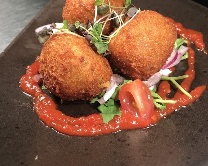 Crisp croquettes with salad at Temple Restaurant in Andersonstown