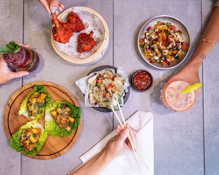 Indo-Chinese sharing dishes at Fatt Pundit in Soho