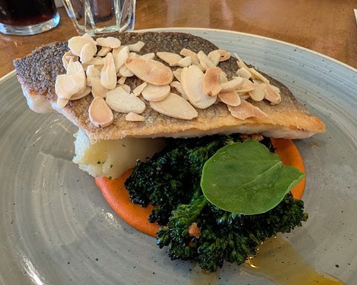Roasted fish with broccoli and toasted almonds at Ginger Bistro Belfast