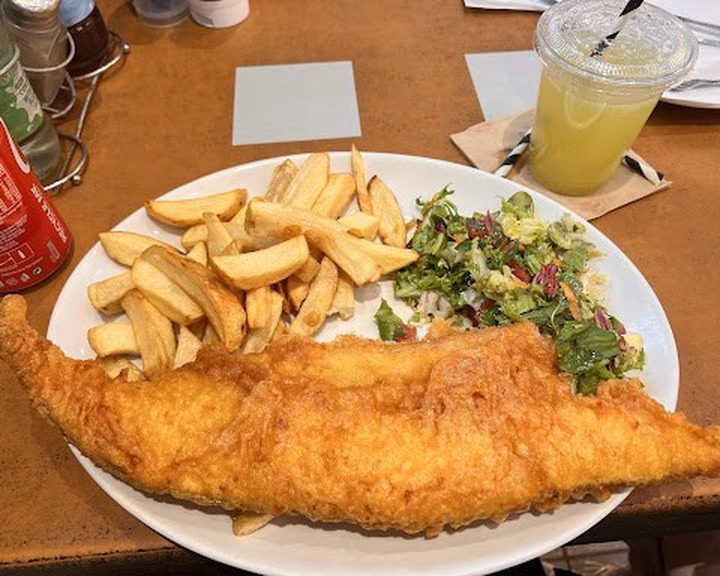 Battered fish with chips and salad at Golden Chippy in Greenwich