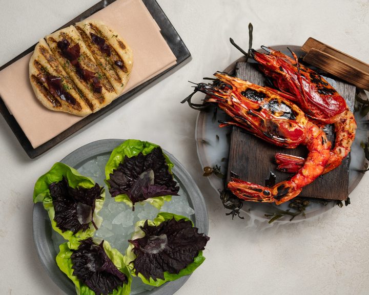 Grilled lobster with lettuce cups and flatbread at HIDE Mayfair