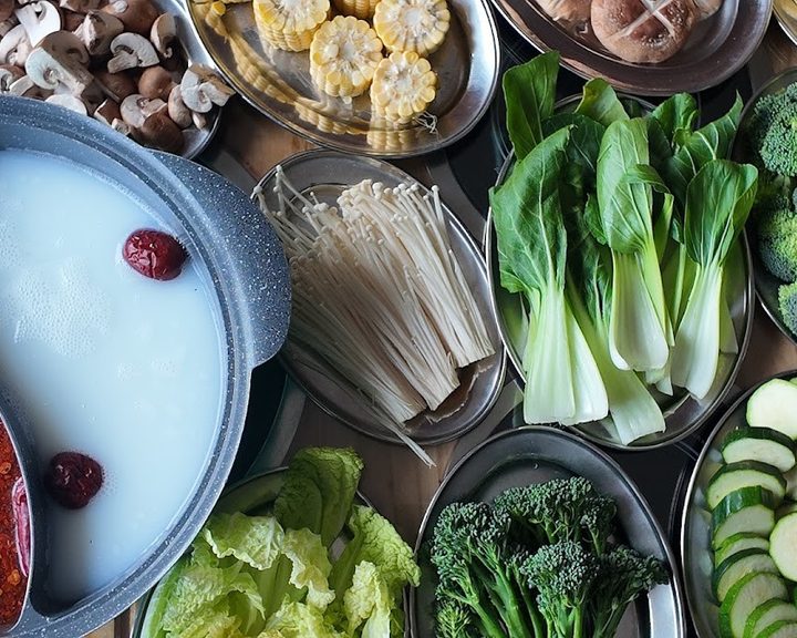 Fresh vegetables, mushrooms and noodles ready for hotpot at Hotpot Spot in Roath