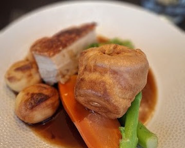 Roast meat with seasonal vegetables at The Tollhouse in Canonmills