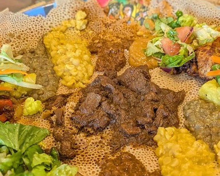 Ethiopian injera with meat and vegetable stews at Zeret Kitchen