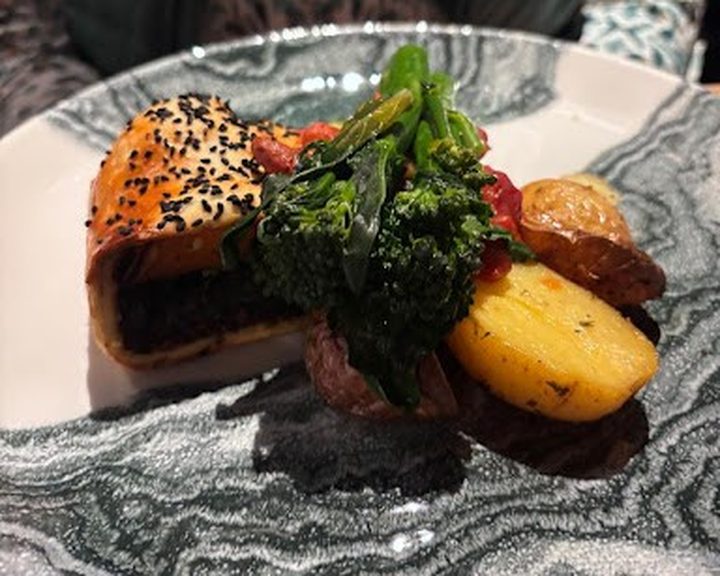 A plated Scottish dish at Amber Restaurant and Whisky Bar in Edinburgh