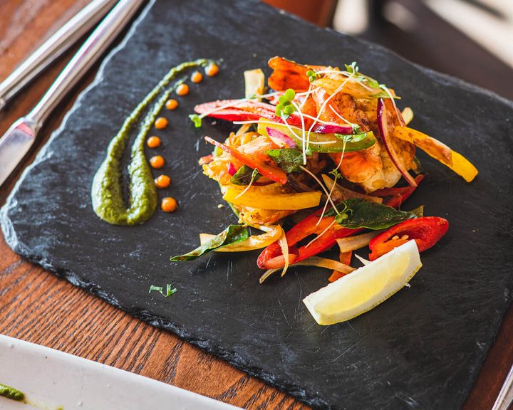 A plated Indian seafood dish at Indian Room in Balham