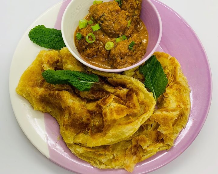 Traditional Malaysian dishes prepared at Normah's in Queensway Market