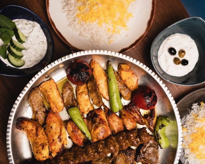 Persian grilled meats with rice and dips at Diba Wimbledon