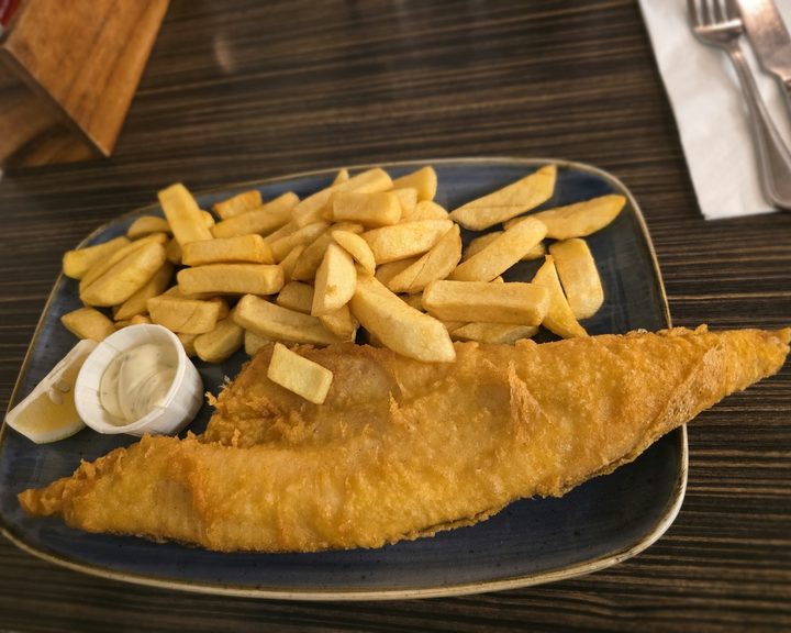 Battered fish and chunky chips at Fishcotheque in Waterloo