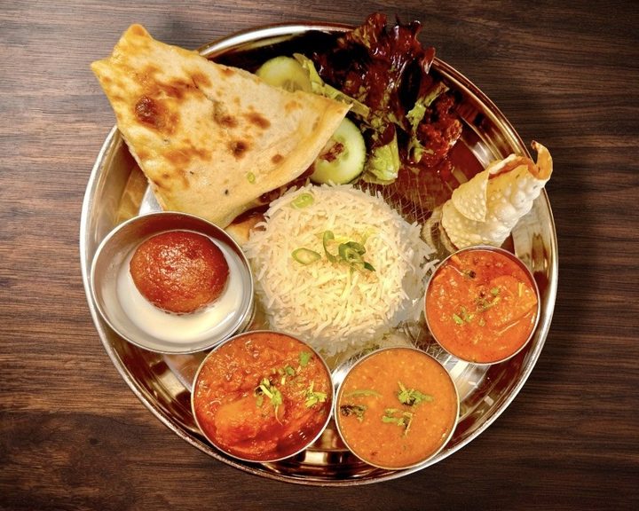Nepalese curry, rice and naan sharing platter at Gurkha Bar in Edinburgh