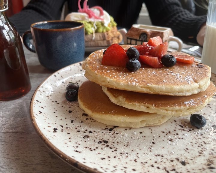 Pancakes with berries at Maggie Mays Stranmillis Cafe
