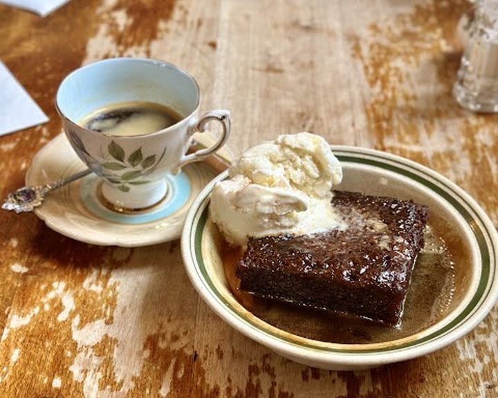 A plated dessert with coffee at Roseleaf Bar Cafe in Leith