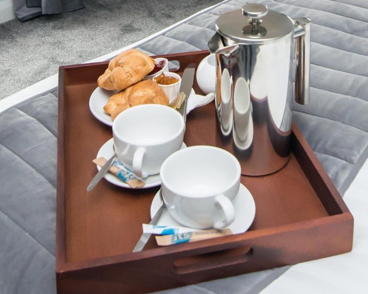 Breakfast pastries and coffee at Standing Stones Lodge near Belfast