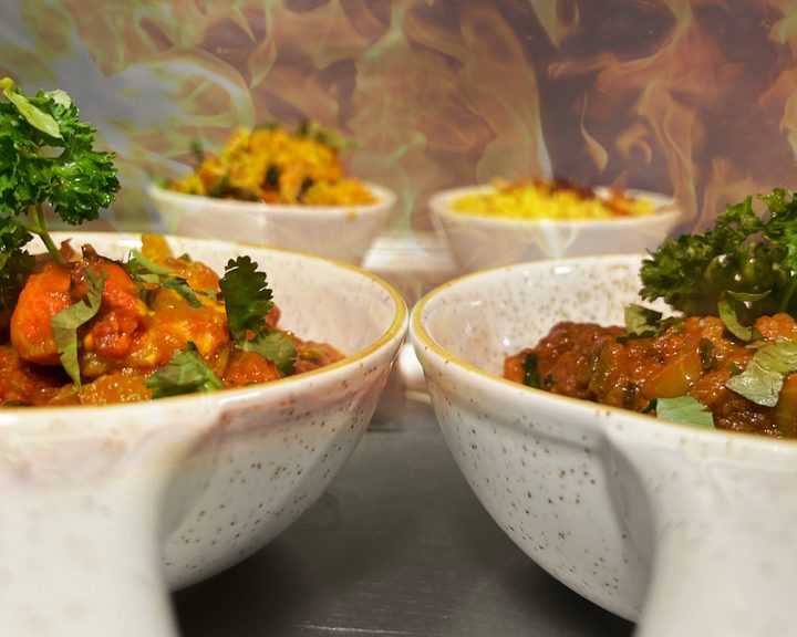 A selection of curries and rice at The Naz in Belfast