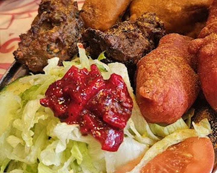 A colourful mixed pakora platter at The Pakora Bar