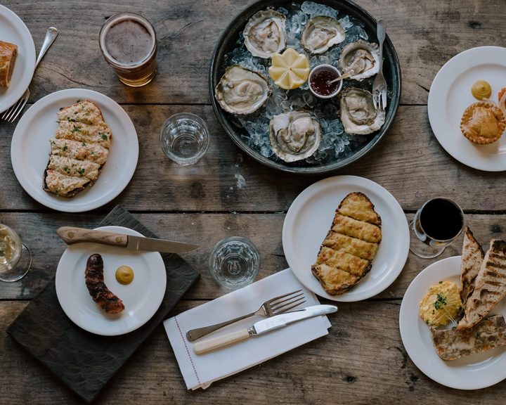 A spread of British pub dishes at The Pelican in Notting Hill