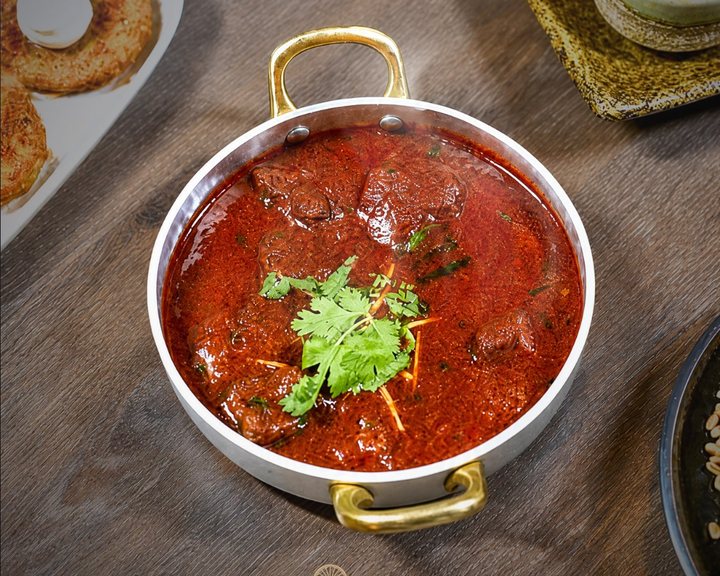 Rich Indian curry at Tokri Indian Restaurant in Acton