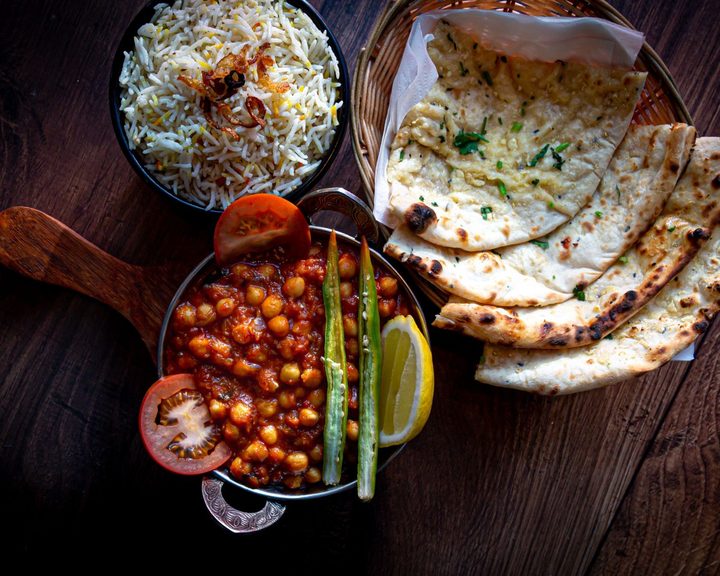 Indian curry, chickpeas, rice and naan at Chaskaa in Tollcross