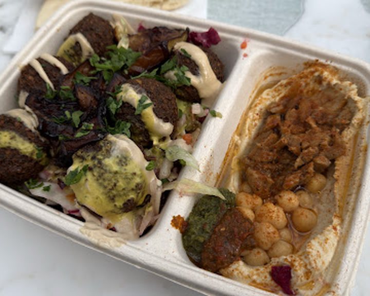 Falafel, hummus and salads at Magic Falafel in Camden Market