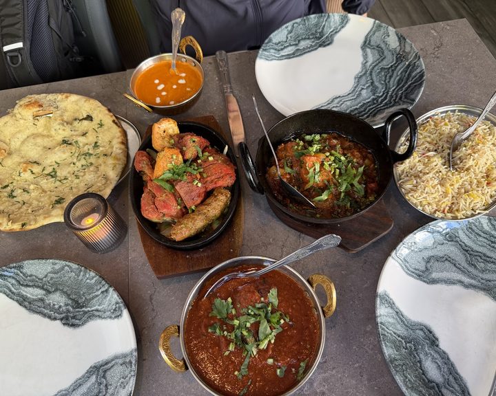 Curries, tandoori meats, rice and naan at Mughal's Paddington