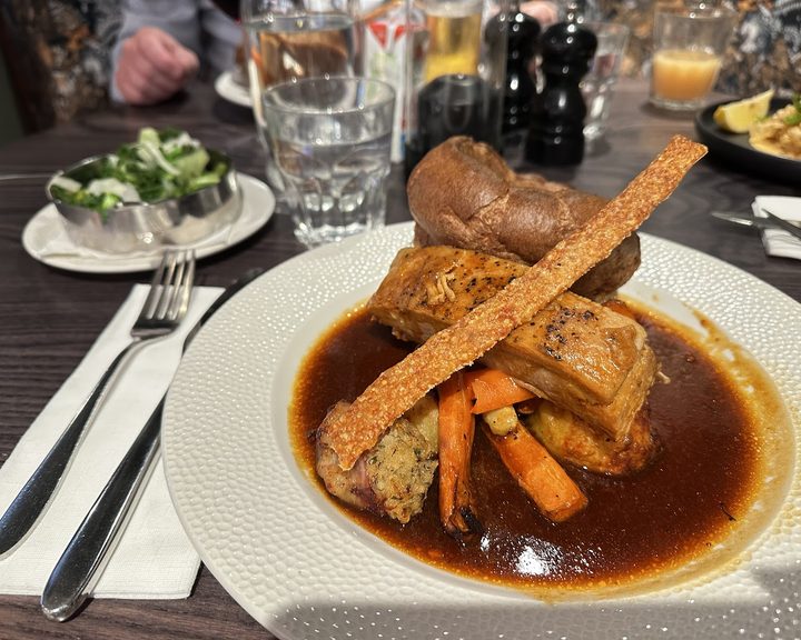 A roast dinner with vegetables at Old Cottage Lisvane