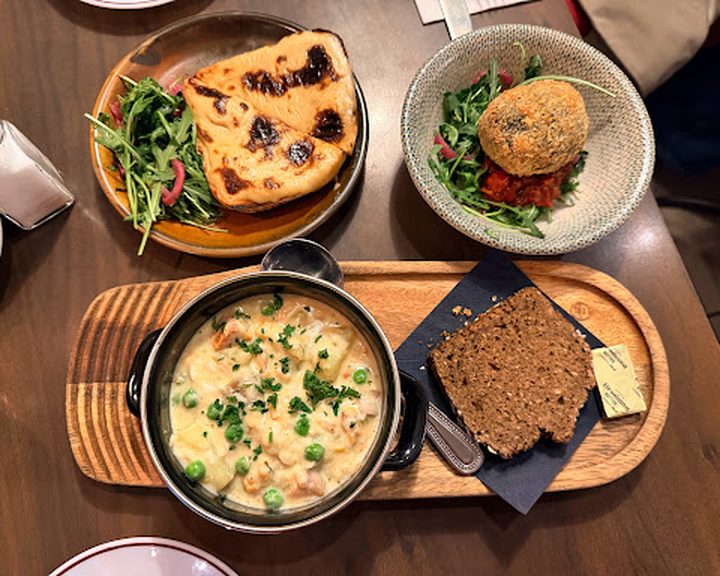 A table of hearty dishes at Darcy's Belfast