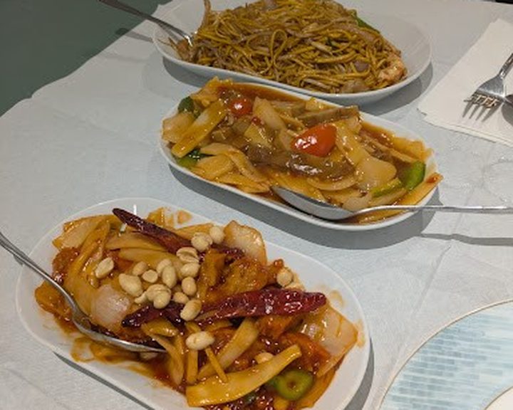 A sharing table of Hong Kong dishes and noodles at In Cafe Cardiff in Cathays