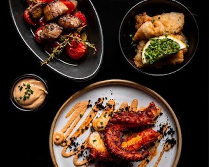 Mediterranean-style grilled meat and seafood plates at No5 Dining and Lounge