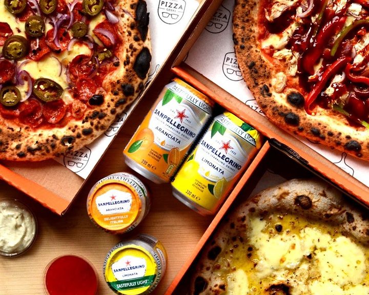 Selection of richly topped pizzas at Pizza Geeks Haymarket