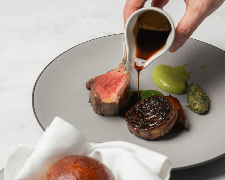 Beef dish being sauced at Wild Honey St James