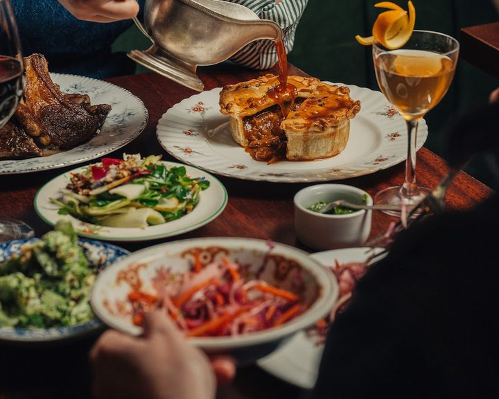 Charcoal-grilled chops and side dishes at Blacklock Covent Garden