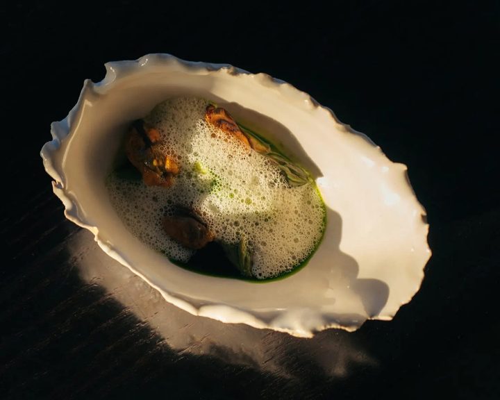 Seasonal tasting-menu dish served in a shell at Cardinal in Edinburgh