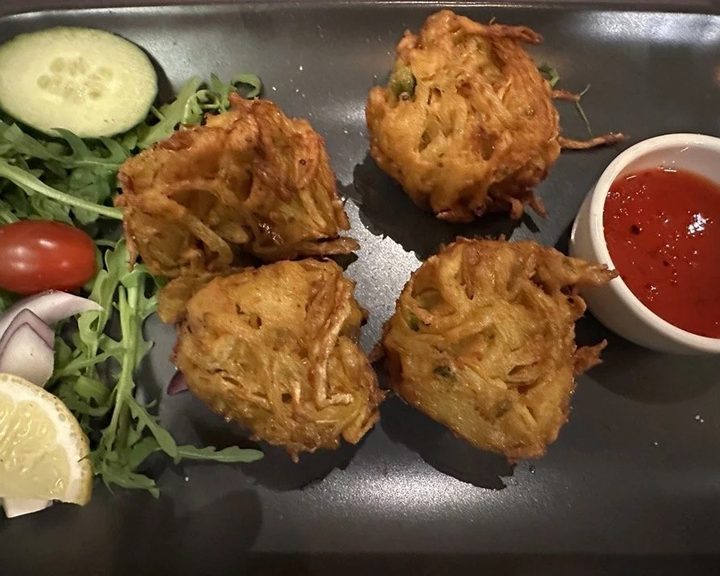 Crisp vegetarian pakora with salad at Cilantro on Leith Walk