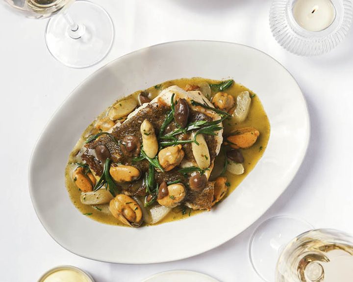 Fish with mushrooms and shellfish at Kitchen W8