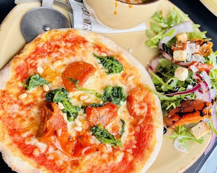 Naples-style pizza with tomato, mozzarella and basil at Little Wing Lisburn Road