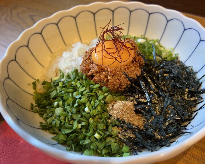 Japanese mazesoba with minced topping, egg yolk, nori and spring onion at Tenmaru