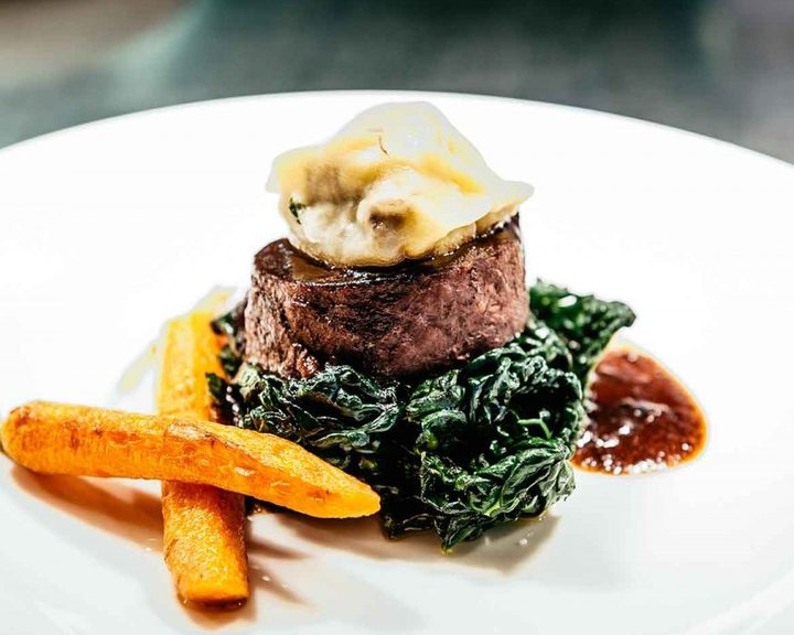 Beef with greens, root vegetables and sauce at The Classroom in Cardiff
