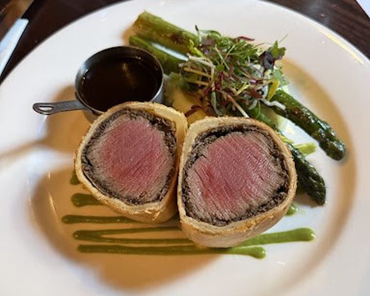 Beef Wellington with asparagus and gravy at The Grenadier
