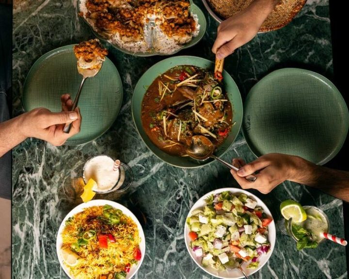 Afghan rice, curry and salad shared at Watan Restaurant Tooting