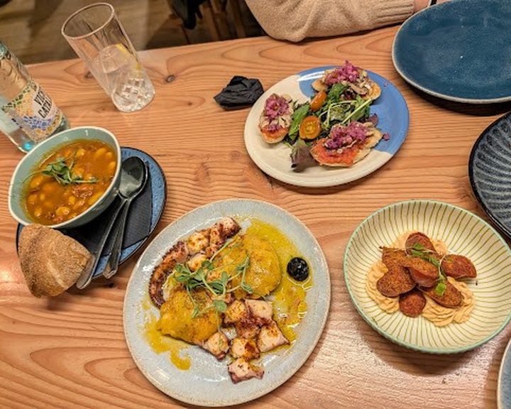 Spanish tapas arranged for sharing at CATA in Stockbridge