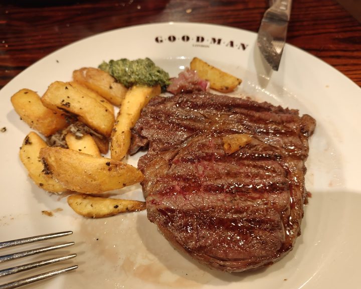 Dry-aged steak and chips at Goodman City