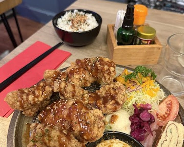 Japanese katsu curry and side dishes at Kawaneko in Edinburgh